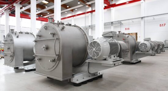 SIEBTECHNIK sieve screw centrifuge CONTURBEX H700 for lactose - hall view in production - 8 machines