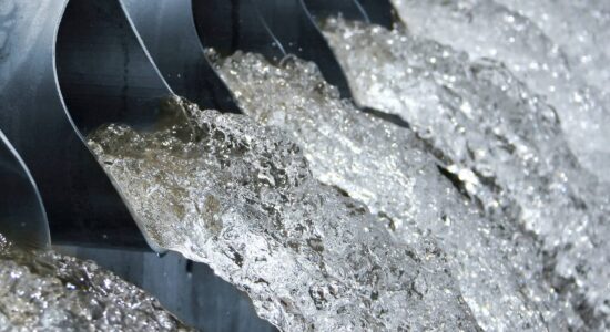 Water flows out of sewage pipes