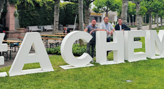 Achema 2024 in Frankfurt am Main Germany - two trade fair fitters and the trade fair organizer